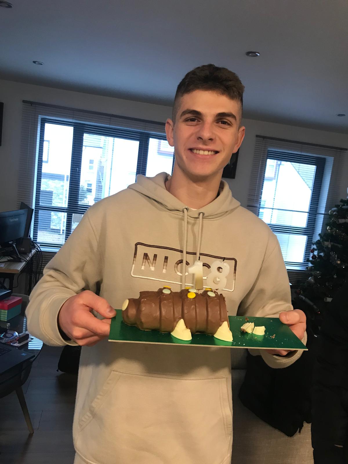 Chris with Caterpillar Cake